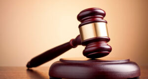 A 24-year-old Castle Bruce man sentenced to 22 years in prison for the murder of businessman Philip Rolle