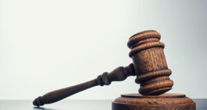 One man has been taken into custody following the stabbing death of a Marigot man